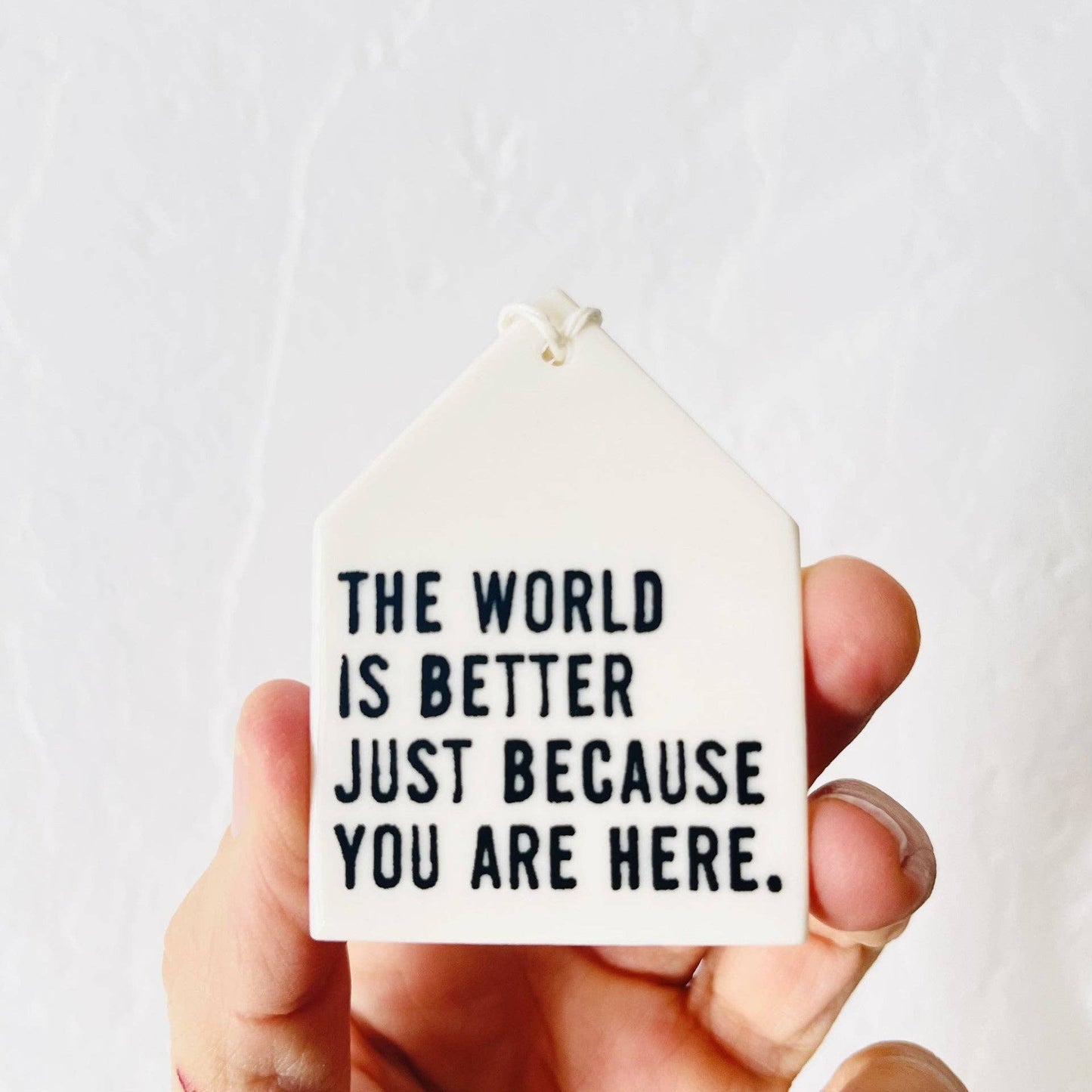 "The World Is Better" Ceramic screen printed quote wall tag